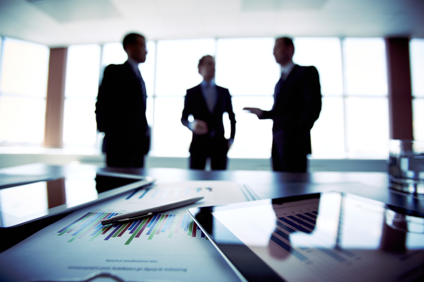 businessmen Generic and slightly blurred photo of three businessmen