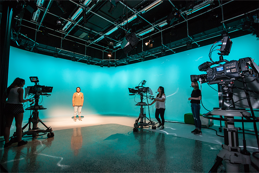 Photo of communications students in the AUT studio