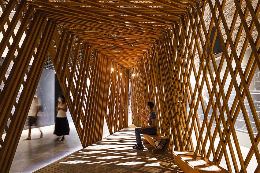 Learning from Trees is a complex, lattice-like, 35 square metre structure that appears to be woven out of wood