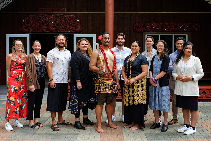 11 appointees to the Eke Tangaroa programme standing in front of AUT's wharenui.