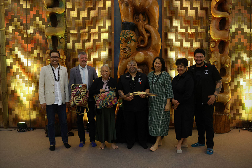 The WIPCE bid delegation and supporters in AUT's wharenui.