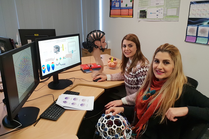 Zohreh and Maryam Doborjeh with the NeuCube machine learning system
